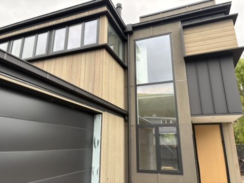 Modern Canterbury home exterior with roof drainage and exterior finishing work